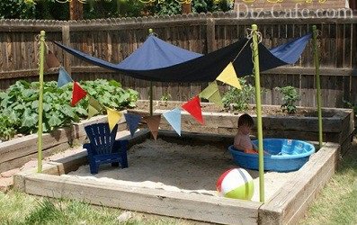 Качели, бассейн и песочница: что поставить на самодельной детской площадке